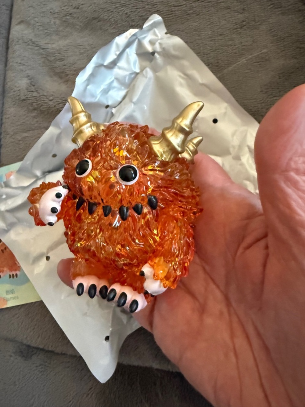 Joyful Life 'Flames' Monster Fluffy - Orange translucent with glitter inside.